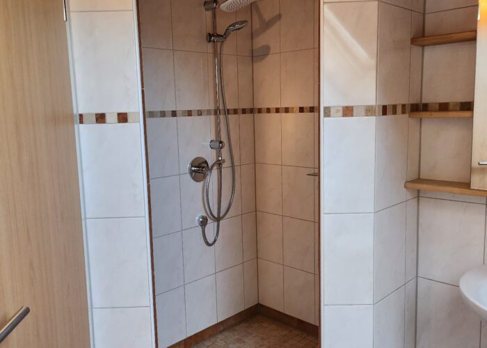 Duschbereich im Badezimmer Duschbereich im Badezimmer